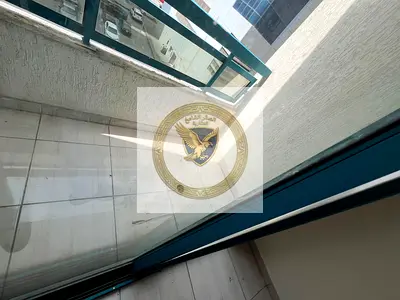 **Beautiful 2BR apartment with hall and balcony, open view, located in Al Qasimia Al Nad, in a prime location close to all services.**
