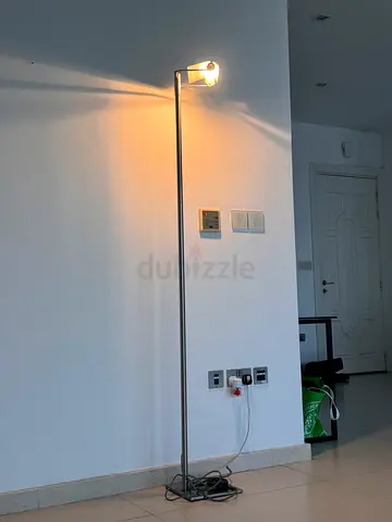 Slim modern stainless steel floor lamp - adjustable head