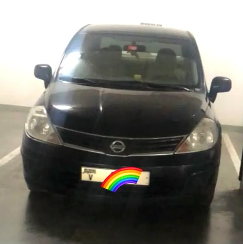 Nissan Tiida 2012 — photo 1 of 11