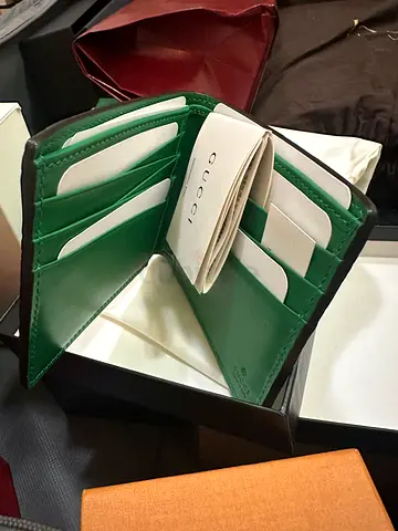Green Gucci bi-fold leather wallet with box