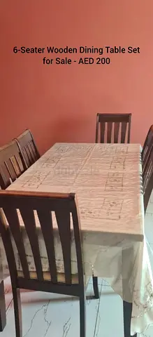 6-Seater Wooden Dining Table Set - Good Condition - AED 200
