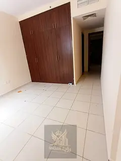The most beautiful and wonderful room and hall in Al Majaz 3, a very clean building with parking ava
