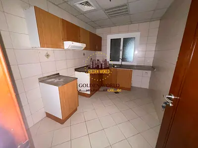 For annual rent in Al Majaz 1: 1 bedroom and living room, 2 bathrooms, master bedroom, free air conditioning, free gym and swimming pool, with payment