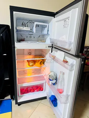 Used Double-Door Refrigerator with Freezer - Good Working Condition