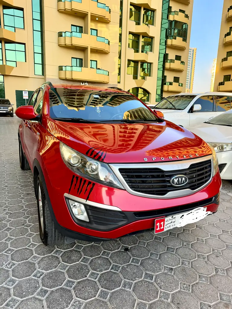 Kia Sportage 2012 — photo 1 of 19