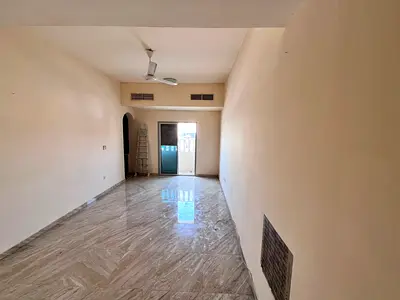 Spacious Studio Apartment - Separate Kitchen - Prime Location Close to All Amenities - Easy Access to Sharjah and Dubai