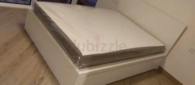 ikea malm king bed with ikea firm mattress   having 2 storage units under the bed