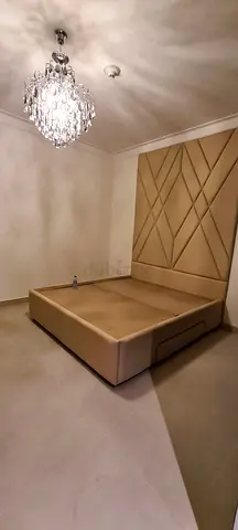 Beige Upholstered Queen Bed with Padded Geometric Headboard