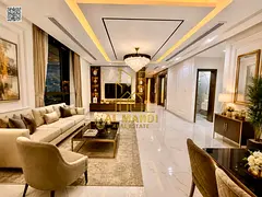 For sale in Al Helio 2, Ajman, with a private pool and natural stone facade. Includes registration a