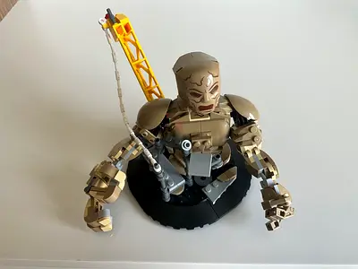 Custom-built Sandman LEGO-style mech with crane arm on display base
