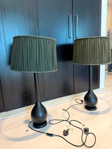 Pair of black metal table lamps with black pleated shades