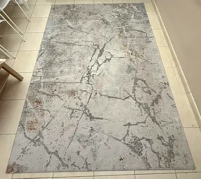 Light grey modern abstract area rug — good condition