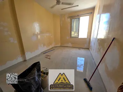 شقة غرفة وصالة للإيجار السنوي في البستان – عجمان | غرفة وصالة منفصلة + تكييف سبليت + موقع مميز