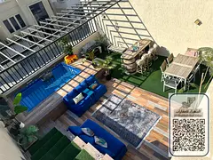 A villa with 5 master bedrooms, a living room, a majlis, 2 kitchens, a swimming pool, and a terrace,