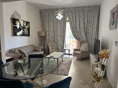 Spacious 1-Bedroom Apartment with Balcony & Side Sea View