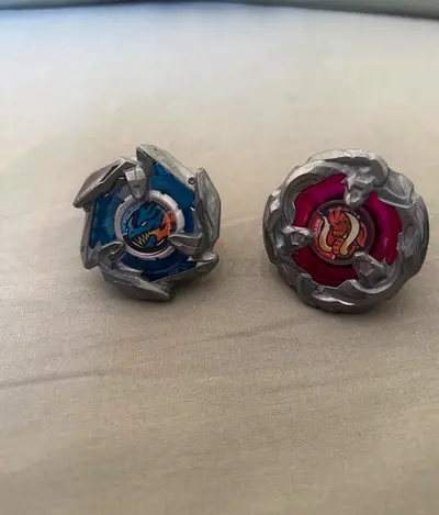 Pair of Beyblade-style Spinning Tops - Blue & Pink, Opened box , not used