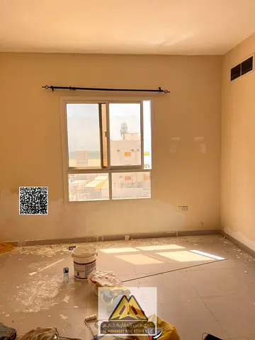 1BR apartment Ajman Corniche 2nd row sea view master room 2 bathrooms ground parking 28K yearly 4 payments prime location ready to move in.