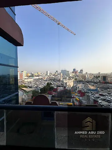 Excellent studio apartment in Al Nuaimiya Tower C, no parking, American kitchen, balcony with open view, excellent space, central air conditioning.