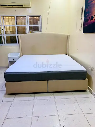 Beige Fabric Double Bed with Storage Base and Headboard — Good Condition