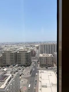 For rent in Al Majaz 2, 2BR apartment with 2 baths, rent 55K yearly, free AC, payment 4 or 6 cheques