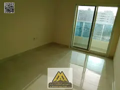 1-bedroom apartment in Al Nakheel 1, Al Karama Street, second row from the Corniche. Private parking