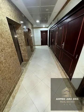 For rent: One bedroom and living room in a new building, first occupancy, with built-in wardrobes and ample space in Al Jurf 3 area, near the Chinese