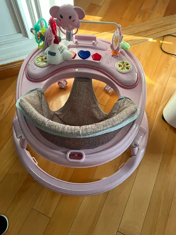 Gently Used Pink Baby Walker / Activity Jumper with Toy Tray