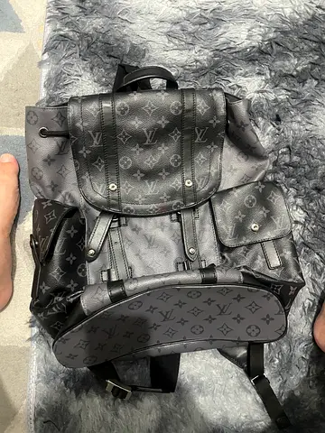 Grey monogram canvas backpack - used, good condition