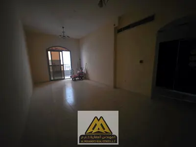 Al Nuaimiya 2-bedroom apartment with a spacious living room. • Separate living room with a practical layout. • Large area. • Excellent natural lightin