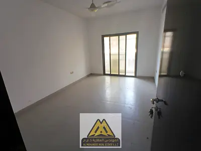 One-bedroom apartment for rent in Al Jurf 3 with a balcony and closed kitchen, near the Chinese market.