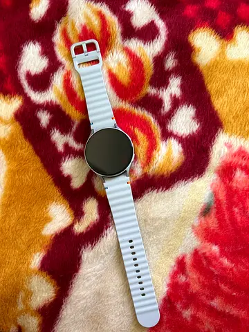 Round Smartwatch with White Silicone Strap - Good Condition