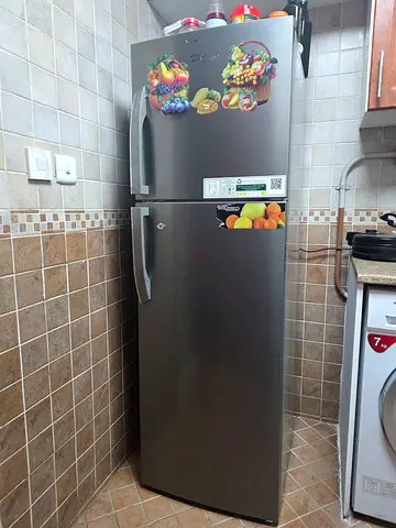 Used double-door refrigerator with bottom freezer - good condition