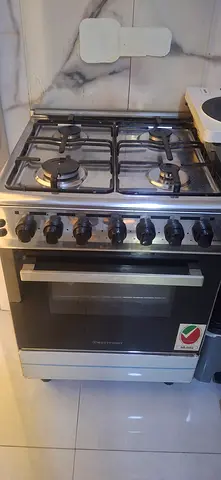 Stainless Steel 4-Burner Gas Cooker with Oven - Good Working Condition