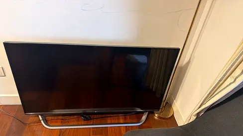 LG Flat Screen Smart TV with Silver Stand