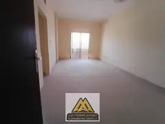 A one-bedroom apartment for annual rent in Al Rashidiya 2, Ajman, featuring a balcony, spacious layo