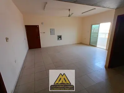 Two bedrooms and a living room | Two bathrooms | Balcony | Central air conditioning | Free maintenance | Easy access to Dubai and Sharjah