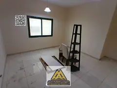 A spacious family apartment with a balcony and beautiful views in the heart of Al Nuaimiya, featurin