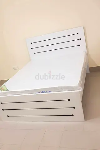 White Wooden Queen Bed with Headboard and Storage Base