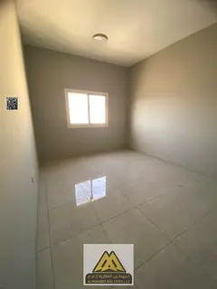 For rent: rooftop apartment in Al Jurf 3, 2 bedrooms and hall, balcony, master bedrooms, built-in wa