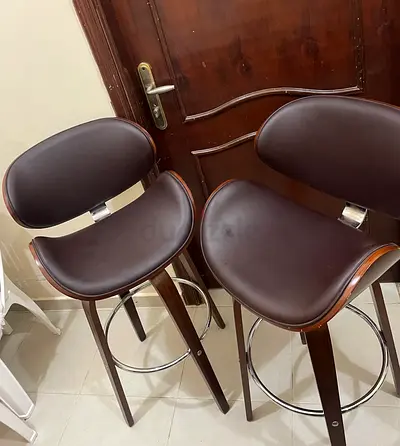 Set of 2 brown bar stools with backrest - wooden frame, chrome footrest
