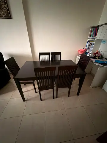 Solid wood dining table with 4 chairs - good condition
