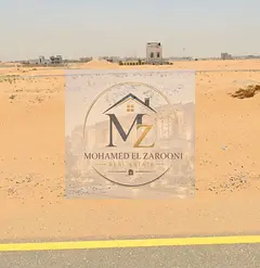 Industrial land for sale in Al-Arqoub, 10,000 sq ft,