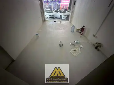 العنوان محل تجاري ميزانين بمساحة كبيرة جدا وموقع استراتيجي للإيجار في الروضة 3 عجمان