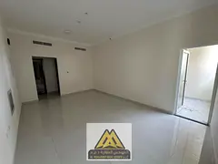 Spacious One Bedroom Apartment with Balcony Free Parking Laundry Room Central AC in a Premium Tower