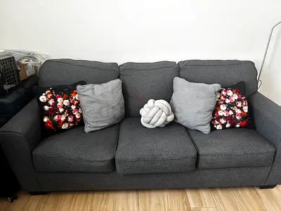Dark grey 3-seater sofa bed in good condition