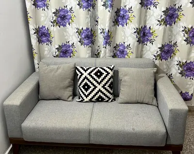 Compact 2-seater Grey Sofa - Excellent Condition.