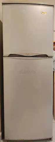 White two-door top-freezer refrigerator - functional, good for small kitchen