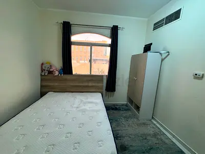 Private room available in family apartment