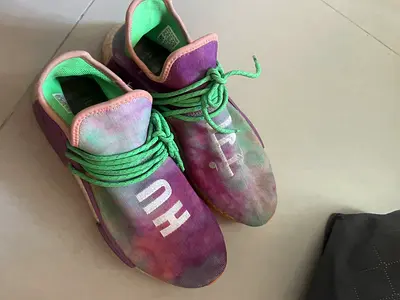 Used Pharrell HU multicolor sneakers, UK10.5