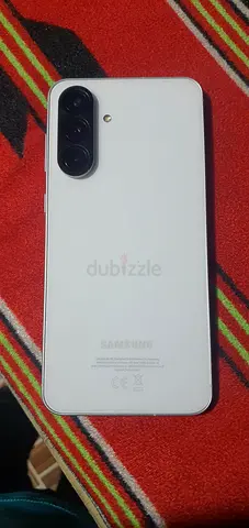 Samsung smartphone (white) with triple rear cameras - good condition